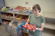 Woman holding apples