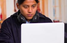 Teenager working at a computer