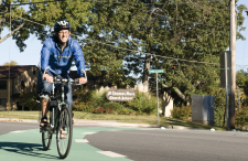 Man riding his bike in a bike lane